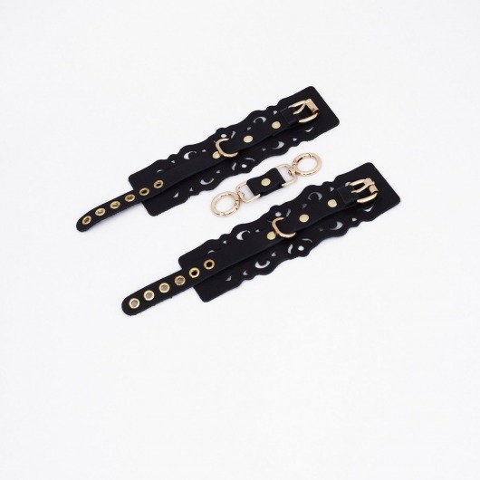 Черные кожаные наручники с узорами и золотистой фурнитурой - Crazy Handmade - купить с доставкой в Ачинске